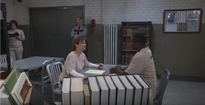 Alexis and Shawn Butler discuss his parole board hearing in the library at Pentonville Penitentiary (2021)