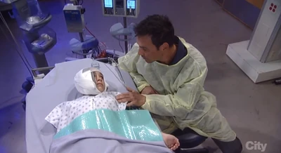 Spencer in the hospital after the fire