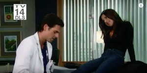 Patrick checks Sam's ankle