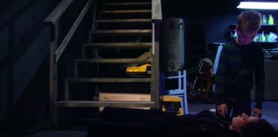 Jake checks on Sam after she falls down the stairs