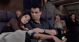 Sam asleep on Patrick's shoulder (on an airplane)