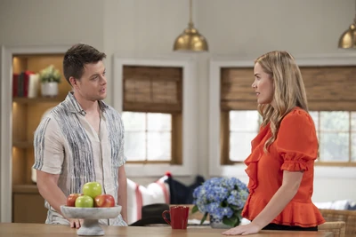 Having a chat in the Q kitchen (2024)