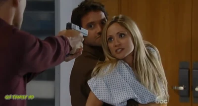 Lulu stands between Dante and a gun crazed Stavros (2014)