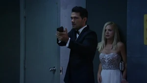 Nathan points a gun at Jake