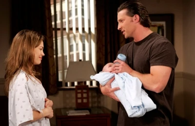 Jason, Elizabeth and baby Jake (telling Jason it's Jake)