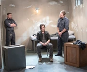 Lucky is guarded in the holding cell (2024)