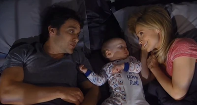 Rocco wakes up in between his parents