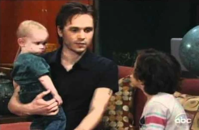 Aiden with his father and brother