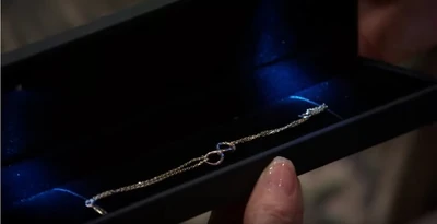 Carly's infinity bracelet from daughter Josslyn (2021)
