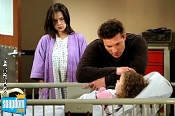 Kristina in the hospital with Jason and Sam after her transplant