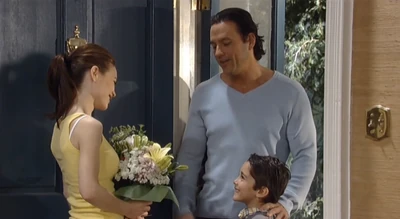 Spencer, along with his father, Nikolas, bring Elizabeth flowers