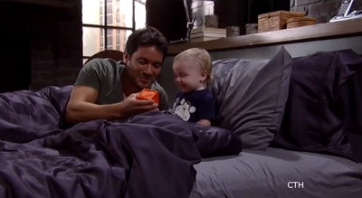 Rocco and his dad in bed