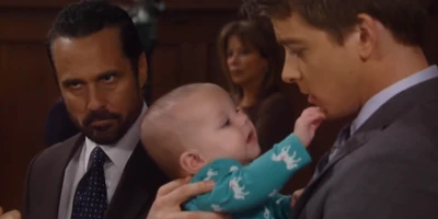 Michael holds Avery (Siblings Avery and Michael)