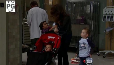 Aiden with his mother and brothers