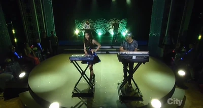 Molly and T.J. perform to the song Just Can't Get Enough. (2014)