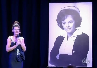 Lucy Coe with a picture of Jessie Brewer