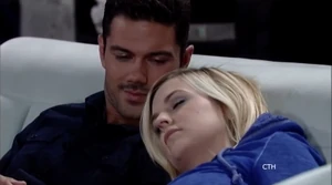 Nathan wakes up to find Maxie sleeping next to him