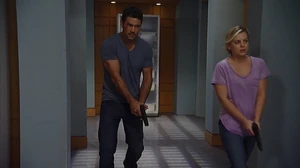 Nathan and Maxie search with guns in hand