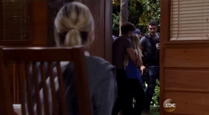 Nathan mouths to Maxie that he's coming