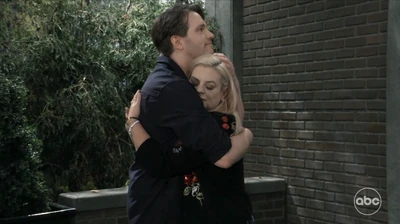 Lucas and Maxie hug at the cemetery (2024)
