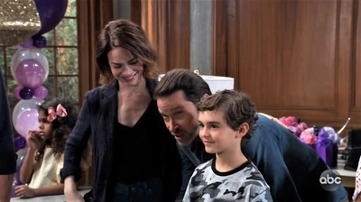 Aiden with mom Elizabeth and step-dad Franco