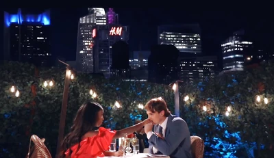 Rooftop dinner against NYC skyline (2023)
