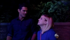 Nathan watches Maxie watch the fireworks