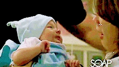 Jason and Elizabeth with their son baby Jake for the first time