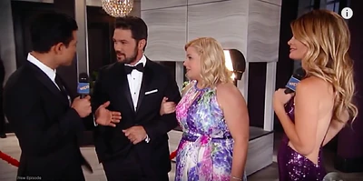 Nathan and Amy walk the rest of the red carpet together