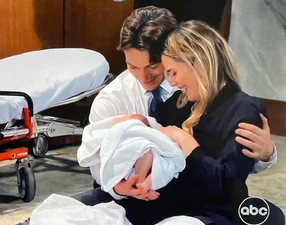 Michael and Sasha with newborn daughter, Daisy (2025)