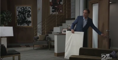 Kevin in the entrance to their home (2021)