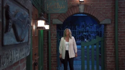 New owner Carly in front of Kelly's (2023)