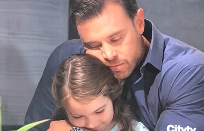 Scout father Drew Cuddling her (2019)