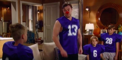 Aiden, Cameron, Jake and Jason dressed as football players for Halloween