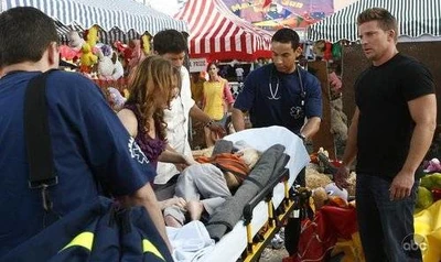 Jake is loaded on to a stretcher