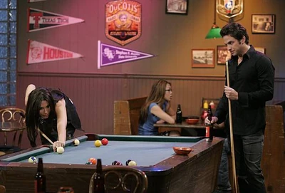 Johnny and Brook Lynn Quartermaine flirt at Jake's pool table. (2010)