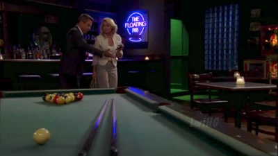 Mac and Felicia exit their new bar The Floating Rib (2012)