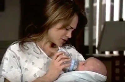 Elizabeth feeds Jake