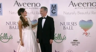 Lucy's red carpet dress and Duke sans kilt