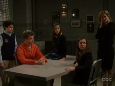 Kristina with her family before Michael goes to prison