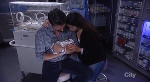 Patrick holds his son