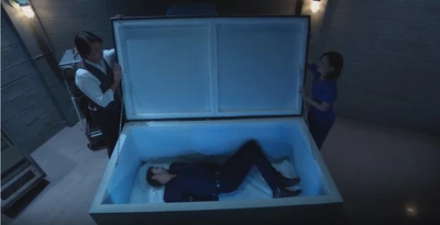 Hamilton Finn and Elizabeth Baldwin hide Peter August's "dead" body in a freezer (2021)