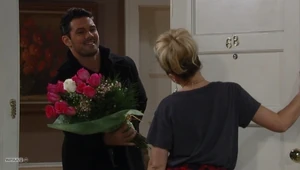 Nathan brings Maxie flowers for Valentines Day