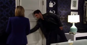 Nathan goes to open the door for Maxie