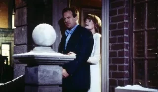 Scott Baldwin and Dominique Stanton outside the mansion (1993)