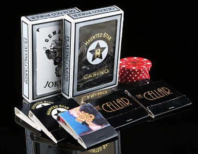 Original The Haunted Star deck of cards, chips, and matchbooks