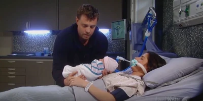 Sam starts to wake up when Drew puts Scout on her chest