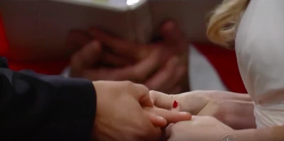 Lulu puts the ring on Dante's finger (2011)