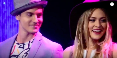 Dillon looks at Kiki after their performance