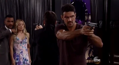 Lulu is held hostage at gunpoint while Dante watches helplessly (2014)